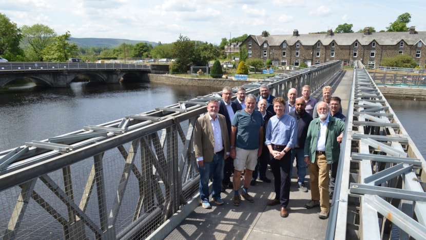 Otley Bridge temporary footway opens: Otley temporary footway with Cllr Pryor