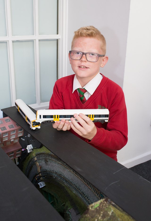 Rail safety model railway: Callum Farthing, 11, with the folding model railway he helped to build with Bognor Regis Model Railway Society