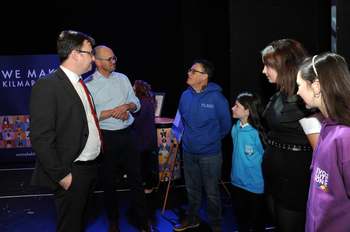 Alex Norris MP chatting with Kayden, Cailyn and Magdalena