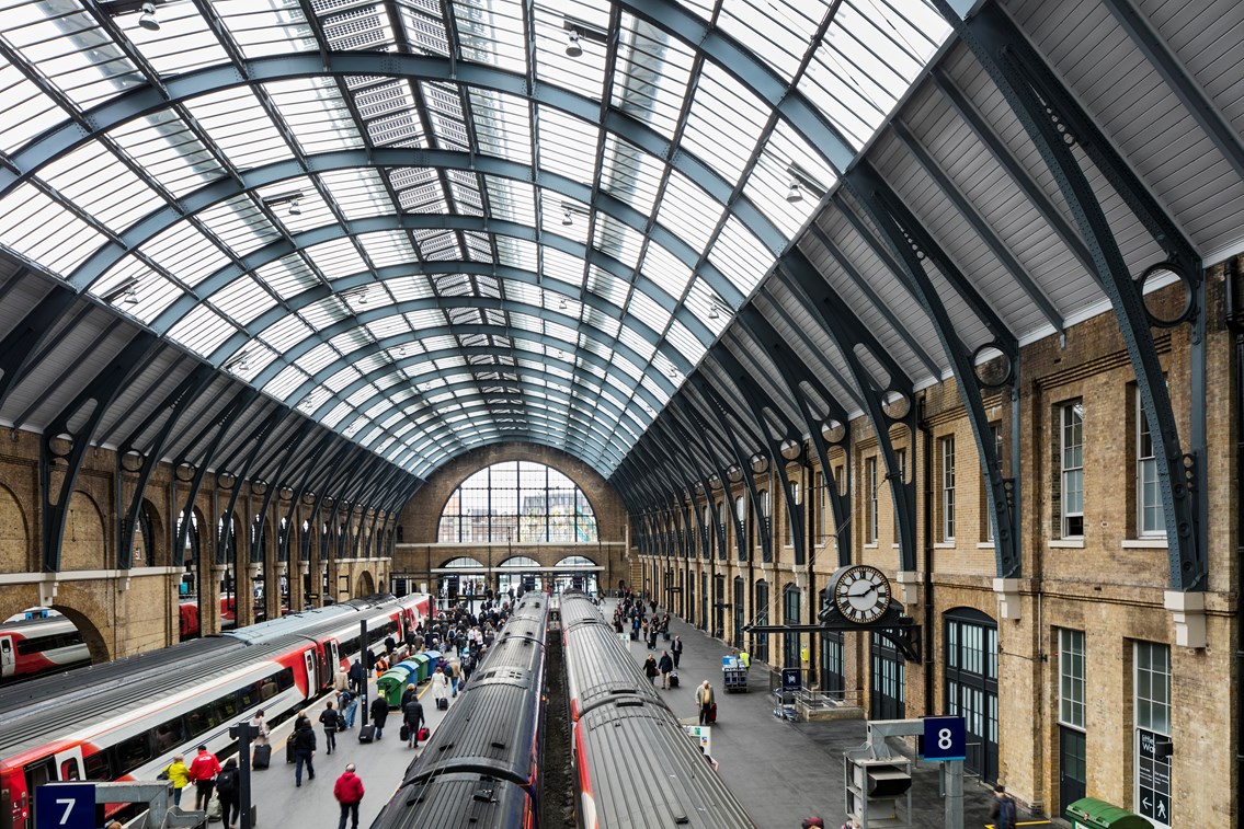 King's Cross railway station - trains at busy platform: king's cross railway station
train station
roof
architecture
John McAslan and Partners