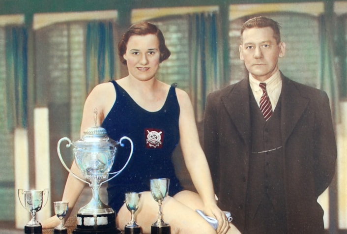 Doris 1: Champion swimmer Doris Storey with her coach.