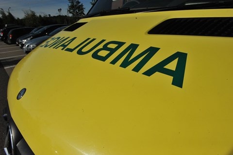 The bonnet of an ambulance with NEAS name