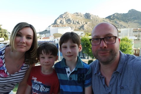 Lucy with husband Antony and sons Oscar and Hugo