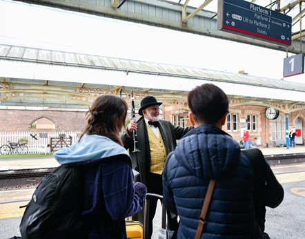 Philip Lowe performs for passengers at Penrith station