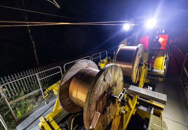 First wires installed to power faster, greener trains in Greater Manchester: OLE WKS - GL 09-26-038