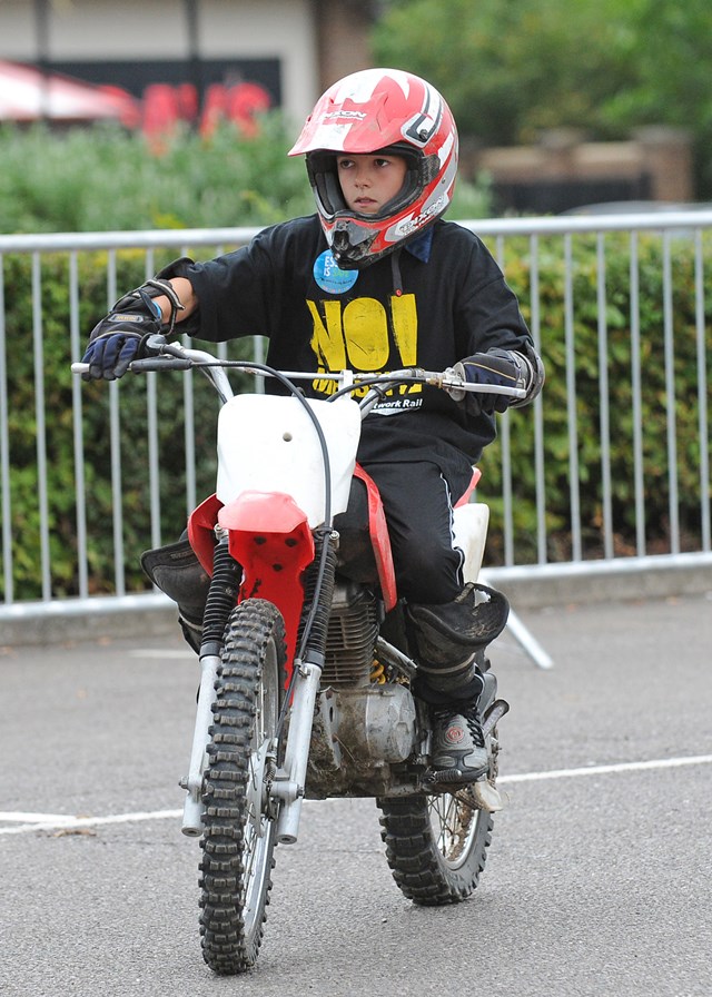 Child tries out a motorbike @ No Messin'! Live, Basildon