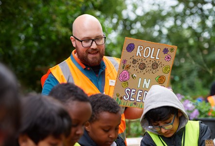 Jordan Pitt, Avanti West Coast Community and Sustainability Champion, teaches pupils how to make bee bombs