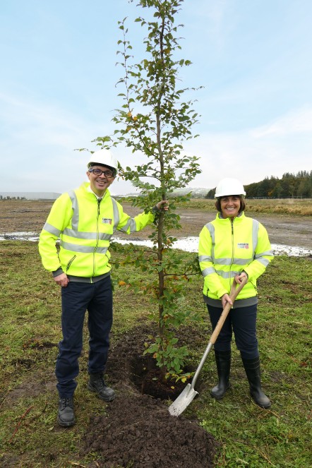 County Councillors Aidy Riggott (left)  and Phillippa Williamson (right) prepare to plant a tree at the Samlesbury Enterprise Zone.