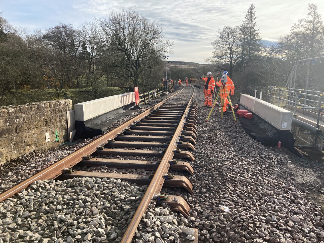 New track, sleepers and ballast laid over the top of the new bridge deck near Commondale station
