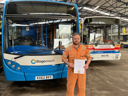 Engineering apprentice James Rostill (Nuneaton Depot, Stagecoach Midlands) shows his apprenticeship certificate