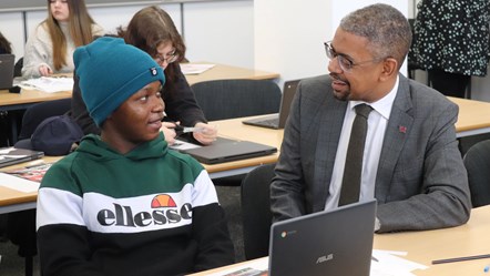 Economy Minister, Vaughan Gething with a learner at Itec in Cwmbran