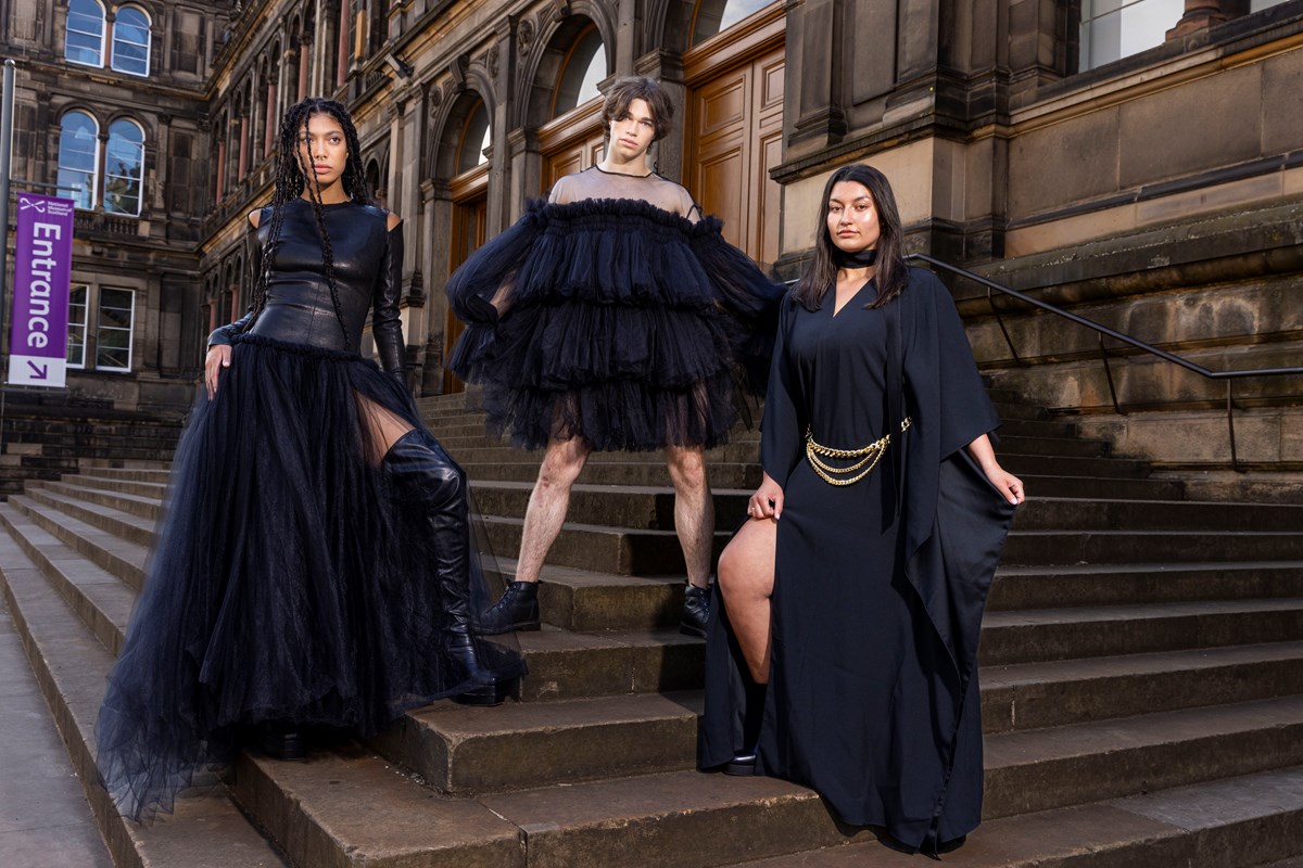 Models (L-R) Grace Dempsey, Joshua Cairns and Shannon Summers arrive at the National Museum of Scotland ahead of the opening of Beyond the Little Black Dress on  Saturday (1 July). The exhibition deconstructs an iconic wardrobe staple, examining the radical power of the colour black in fashion. Image copyright Duncan McGlynn.