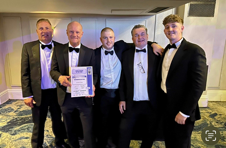 Image shows (left to right) Gary Stanton, Craig Harrop, James Hill, Tim Owen and Daniel Carey collecting Manchester Victoria Highly Commended Award