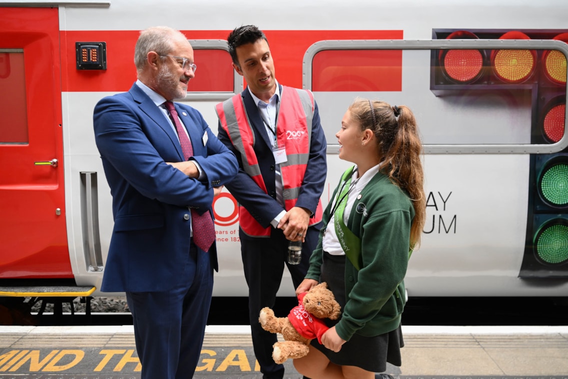  Sir Andrew Haines, chief executive of Network Rail with Rob and Aimee Lowe in front of the Railway 200 Exhibition Train