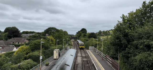 GWR train arriving into Maiden Newton station