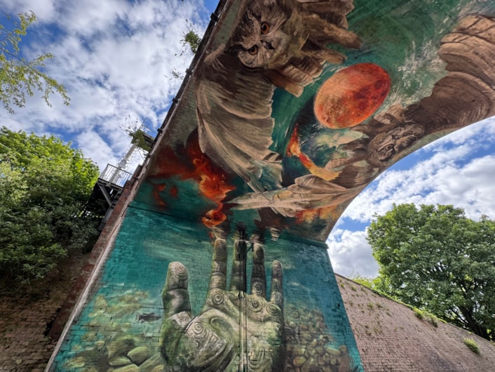 International artist designs striking new mural for city centre park: Mural Penny Pocket Park-4