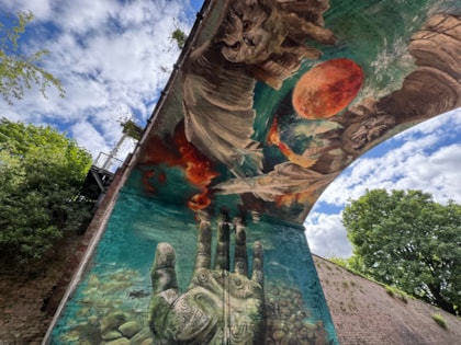 International artist designs striking new mural for city centre park