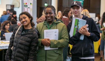 Families visiting the Future Ready! Preparing for Adulthood event in October 2025 with copies of the Preparing for Adulthood Guide