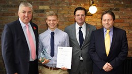 Reece Sandy receiving his award with Pete Mosley, Steve Foxley and Jeffrey Lee of Mitie.: Reece Sandy receiving his award with Pete Mosley, Steve Foxley and Jeffrey Lee of Mitie.