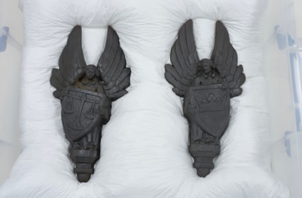 Cast iron angels carryings shields designed by Alice Meredith Williams.  Image (c) Neil Hanna (1)