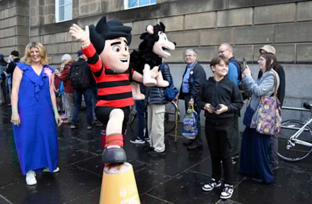 Beano fans queue outside the National Library of Scotland's George IV Bridge building. The Library was giving away special centenary editions of the comic to mark the Library's 100 birthday, which fell on 7 August. Credit: Neil Hanna
