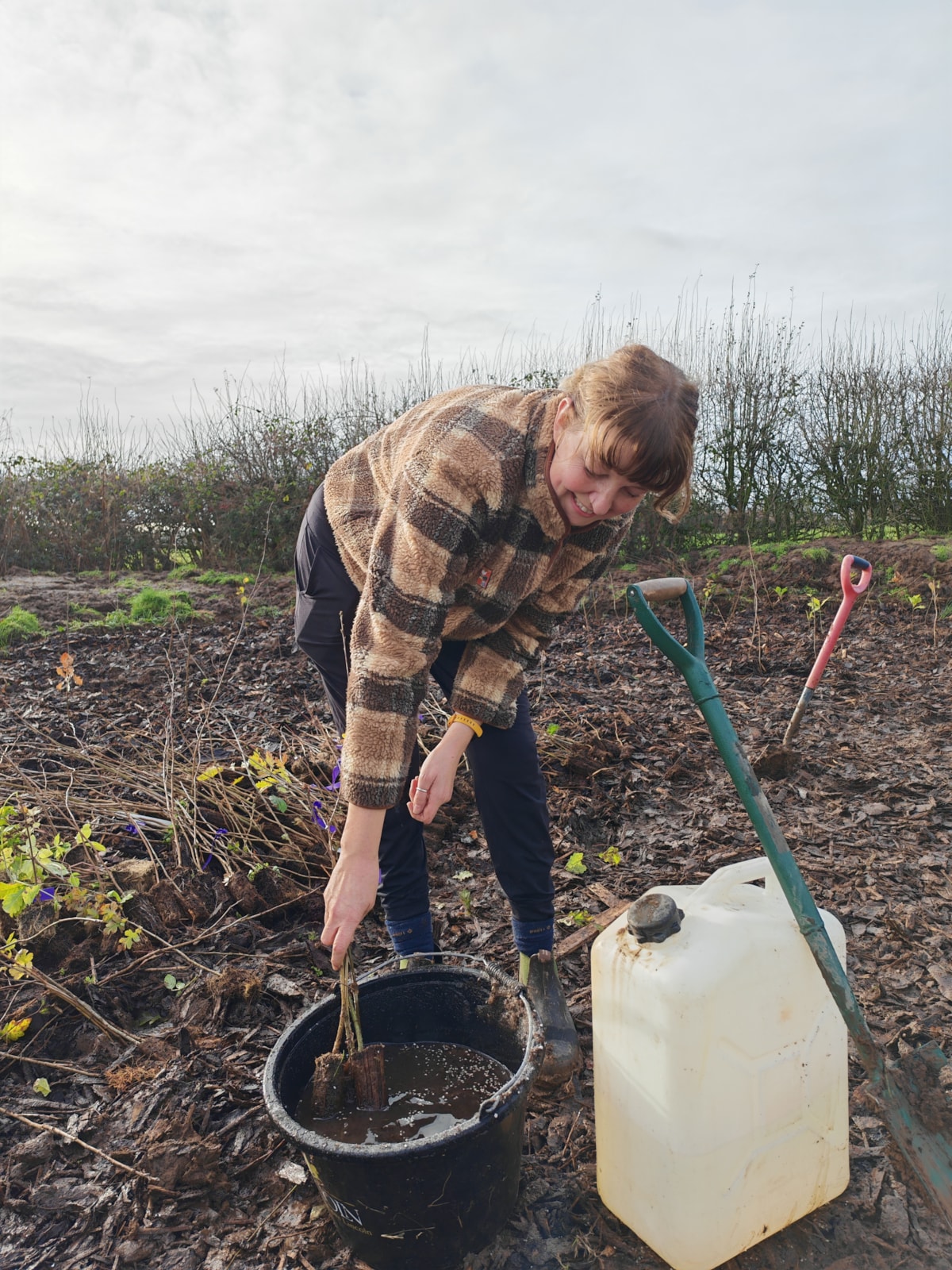 Aileen from the Treescapes team stirs up a batch of potting solution