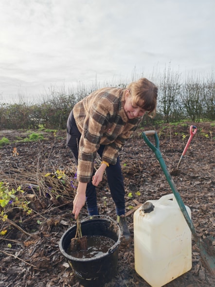 Aileen from the Treescapes team stirs up a batch of potting solution