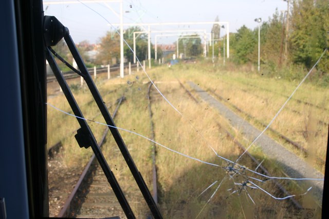 Damage caused to driver's cab by stone throwing: .