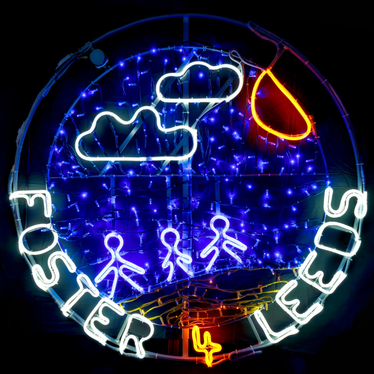 Foster 4 Leeds Light Night 4: The neon rope light created for Light Night Leeds based on two drawings by children living in foster care - one by a five-year-old girl of people in the sea, and another by an eight-year-old boy of a beach scene.