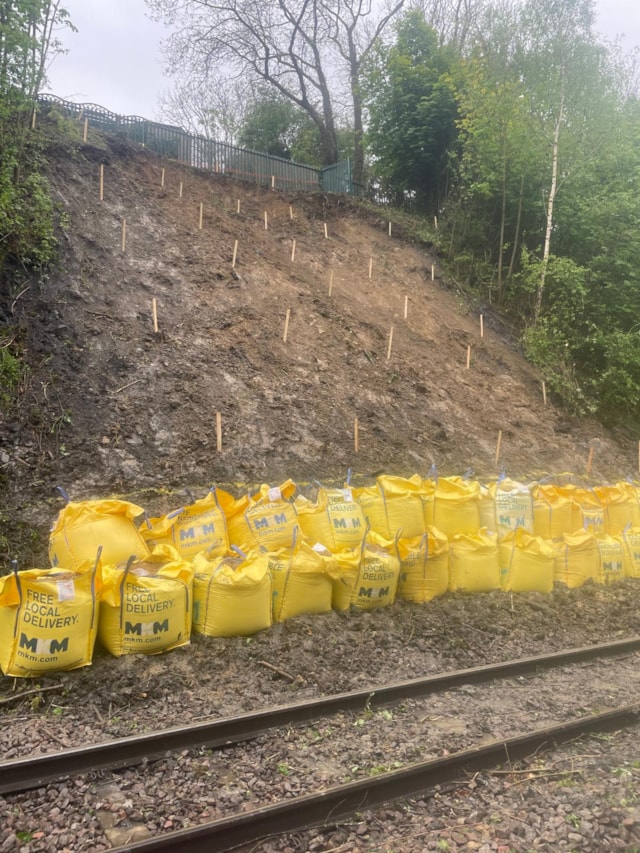 Monitoring pegs and ballast bags installed at Scunthorpe landslip, Network Rail