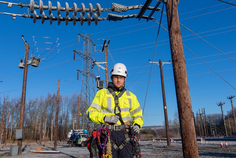 An Electricity North West overhead linesperson