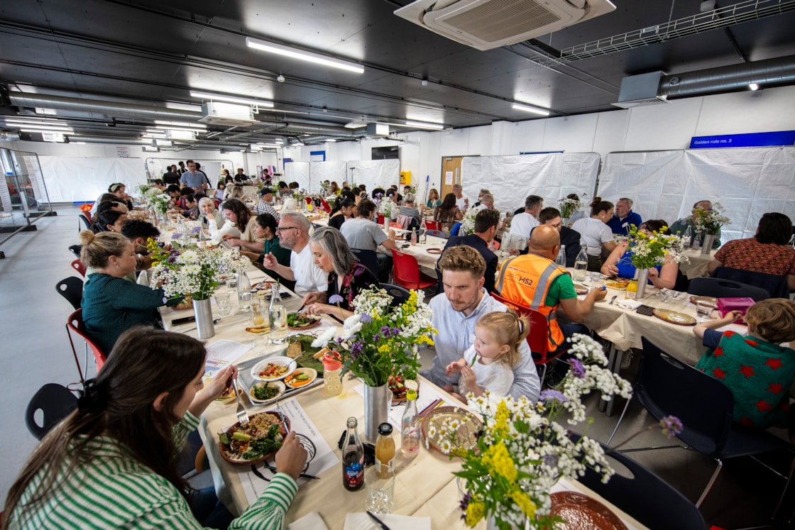 Community lunch at OOC using dinner service made by young people using excavated clay