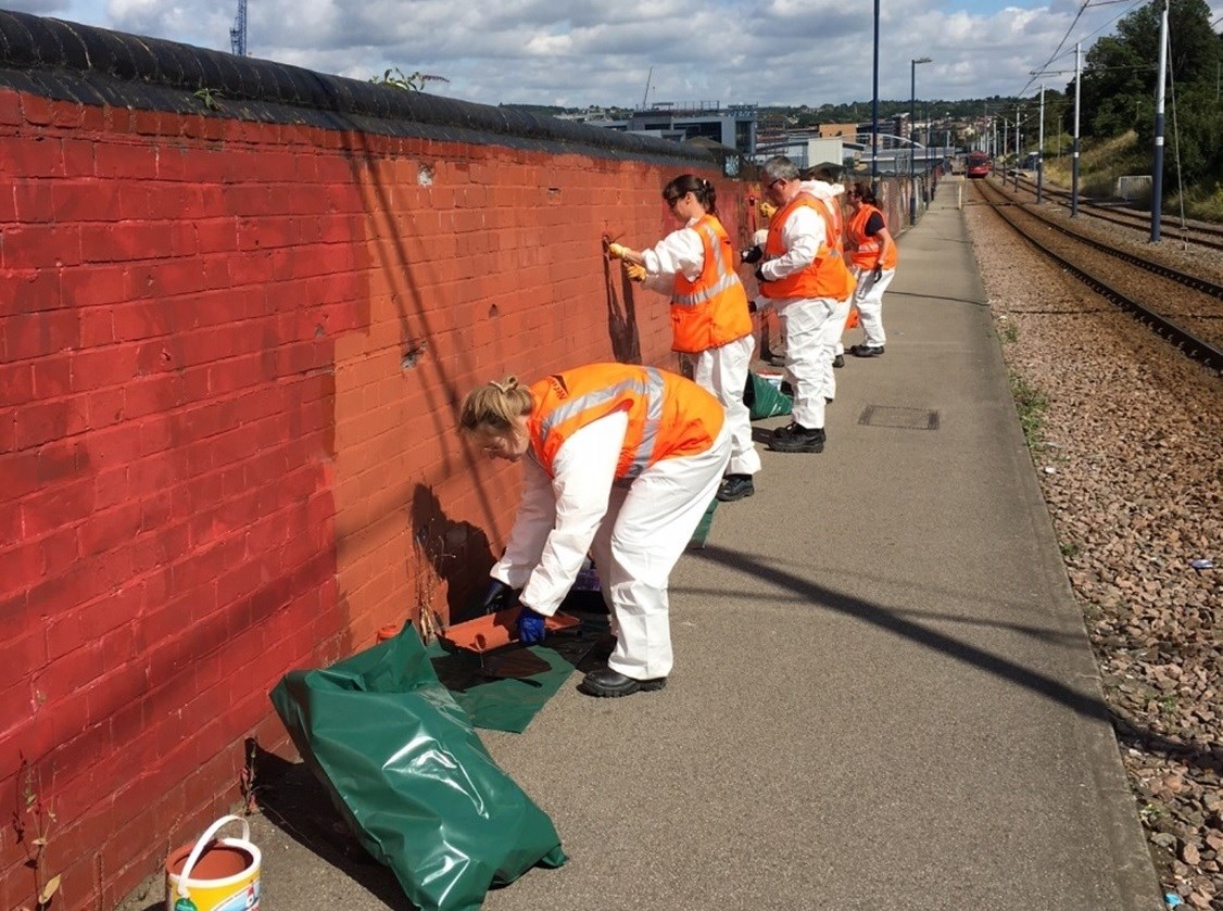 Network Rail volunteers carry out clean up at Sheffield station: Volunteers working on Granville Street in Sheffield-2