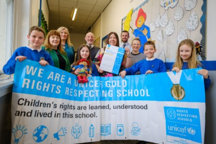 Cllr Cowan with Linda McAulay-Griffiths, HT Mr Spooner, Mrs Kerr, Robert Chatham, Karen Watson and Hugh, Holly, Millie and Christopher