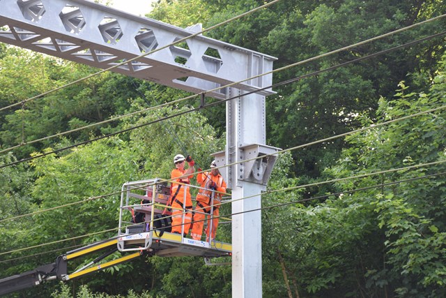 Overhead line upgrade on key rail route into London means fewer heat-related delays for passengers: Work to overhead wires at Shenfield  239402