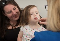 Jura Warburton receives her flu vaccination