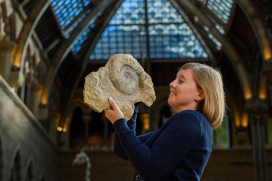 Dr Emily Swaby, Earth Collections Assistant at the OUMNH with a fossil discovered on the HS2 project-2: Dr Emily Swaby, Earth Collections Assistant at the OUMNH with a fossil discovered on the HS2 project-2