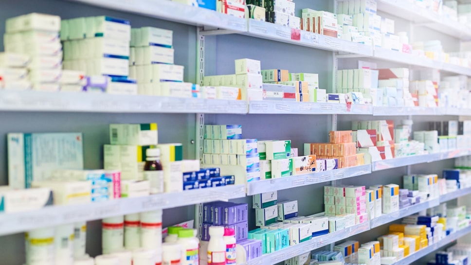 Prescription medicines on a pharmacy shelf