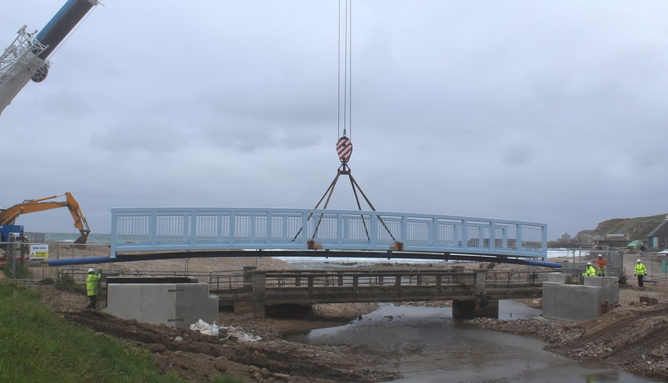 New bridge deck lifted into place