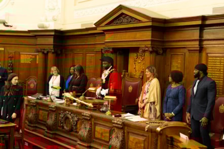 Mayor of Islington, Cllr Jason Jackson standing in the Council Chamber