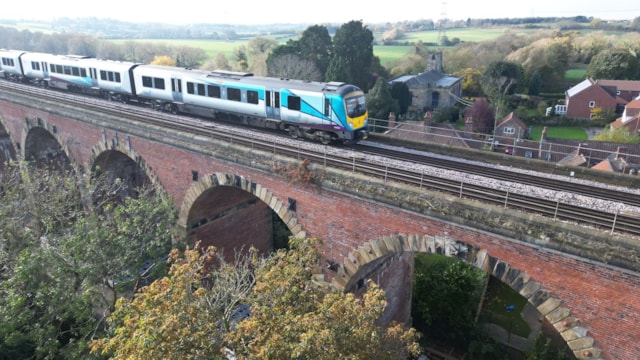 Drone pictures and video released of £8m Yarm Viaduct strengthening work: DRONE SHOT - TPE train on Yarm Viaduct