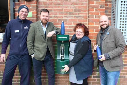 The new water fountain at London Fields Lido (From L to R_ Rafal Cymbalista, General Manager at London Fields Lido, Cllr Jon Burke, Caroline from the Hoxton Beach Cafe kiosk at the Lido and Mayor Philip Glanville at 