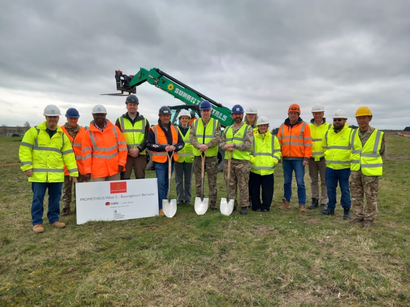 Adam Lee, Jerry Gombwe, Mark Shallcross and Mark Ashworth, Custom Solar, alongside Colonel Gareth Boyd, Lieutenant Colonel Ed Brooks and representatives from the Army, DIO, and Mott MacDonald at Bassingbourn Barracks