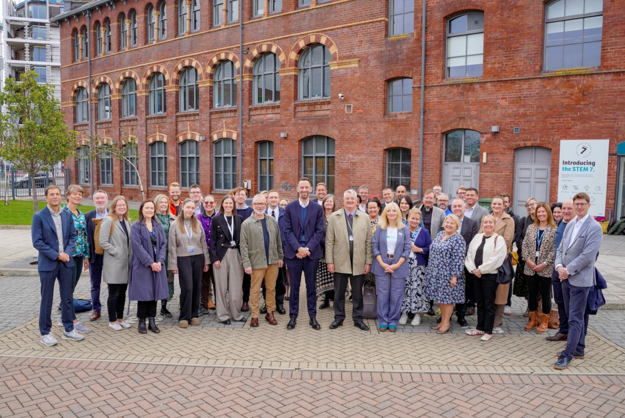 A number of representatives from Team Leeds coming together to launch the Leeds Ambitions