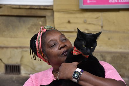 Angie Hunte and Huddersfield Station cat, Bolt