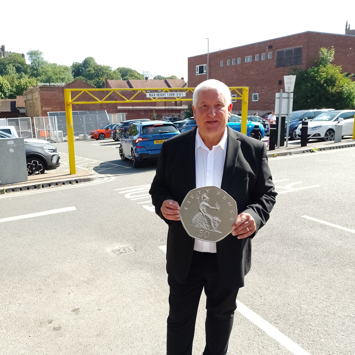 Cllr Patrick Harley promoting the new 50p parking rate