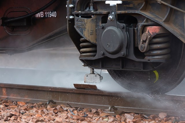 Scotland’s Railway ready to keep passengers moving this autumn: Autumn - Water Jetting in action - Rail Head Treatment Train