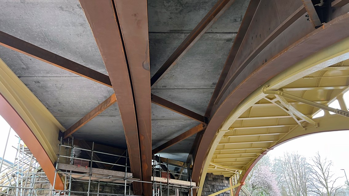 Underneath Buxton Road bridge showing the new concrete deck and Victorian structures side by side
