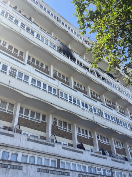 A photo of the exterior of Sara Lane Court showing the flat affected by the fire on 24 April 2026