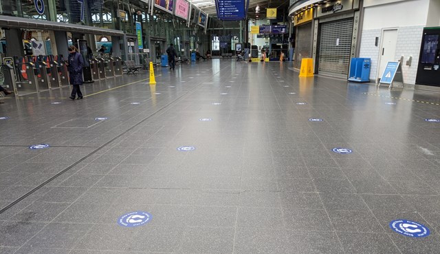 The social distancing stickers on the floor of Manchester Piccadilly